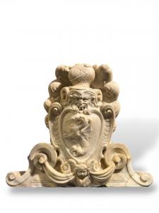 Large heraldic coat of arms carved in marble